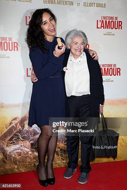 Journalist Aida Touihri and a guest attend the 'L'Histoire de l'Amour' Premiere at Gaumont Capucines on November 7, 2016 in Paris, France.