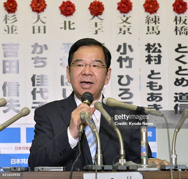 Japan - Kazuo Shii, head of the Japanese Communist Party, holds a press conference in Tokyo shortly after midnight of June 23 after the party...