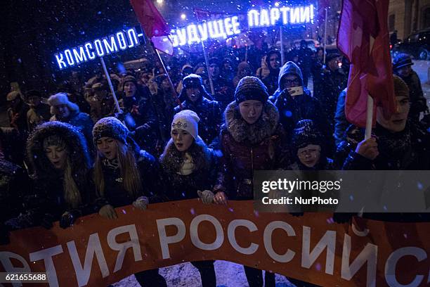 Russian communist party members carry red flags and shout slogans in central St.Petersburg, Russia, 07 November 2016, during their rally to mark the...