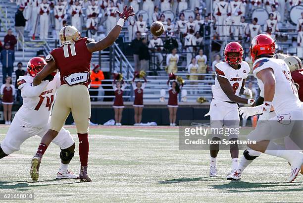 Boston College defensive end Wyatt Ray can not stop the pass form Louisville Cardinals quarterback Lamar Jackson to Louisville Cardinals tight end...