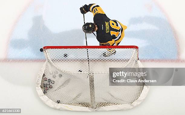 Matthew Strome of the Hamilton Bulldogs gets the warm-up pucks ready prior to play against the London Knights in an OHL game at Budweiser Gardens on...