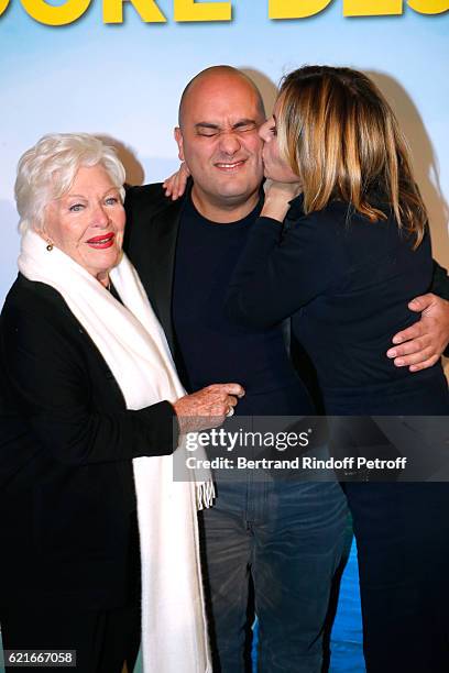 Singer Line Renaud, Co-Director Jerome Commandeur and actress Mathilde Seigner attend the "Ma famille t'adore deja' Paris Premiere at Cinema Elysee...