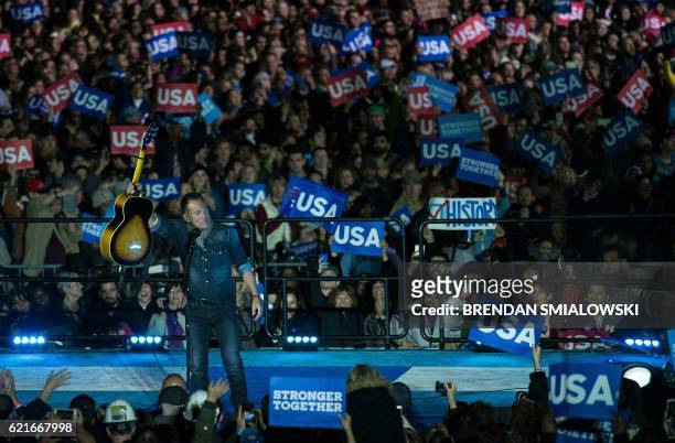 Singer Bruce Springsteen performs during a rally for Democratic presidential nominee Hillary Clinton, former US President Clinton, and US President...
