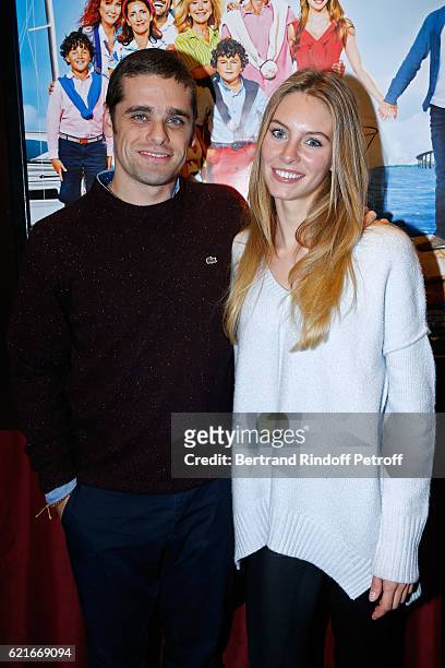 Actors of the movie Arthur Dupont and Alicia Endemann attend the "Ma famille t'adore deja' Paris Premiere at Cinema Elysee Biarritz on November 7,...