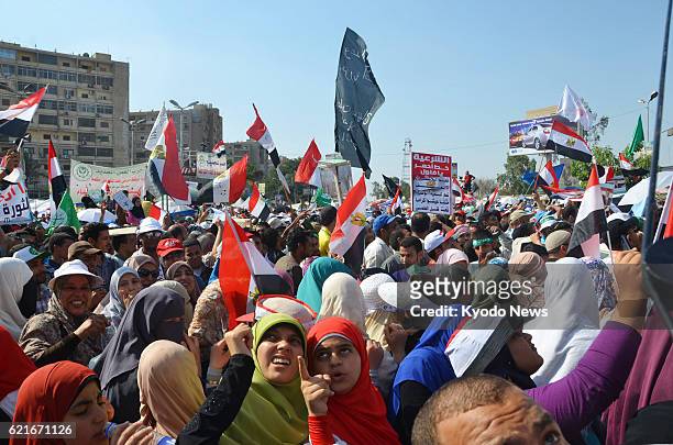 Egypt - Supporters of Egyptian President Mohammed Morsi hold a rally in Nasser City near Cairo on June 28, 2013.