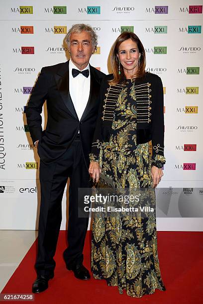 Cristina Parodi and Massimo Giletti attend a photocall for the MAXXI Acquisition Gala Dinner 2016 at Maxxi Museum on November 7, 2016 in Rome, Italy.