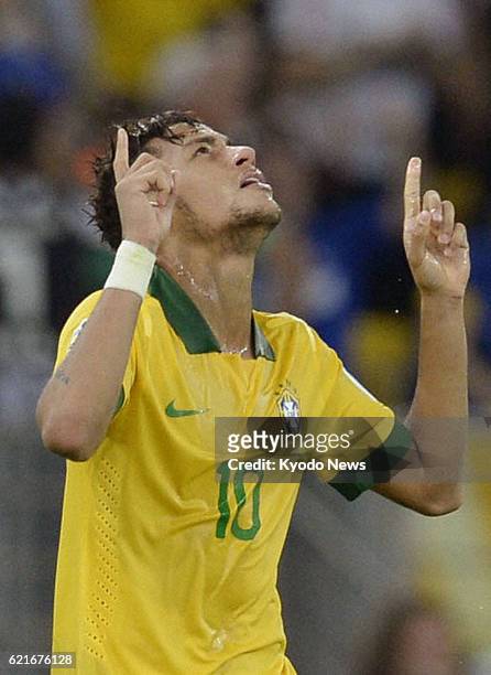 Brazil - Brazil's Neymar celebrates after scoring the team's second goal just before halftime in the Confederations Cup final against Spain in Rio de...
