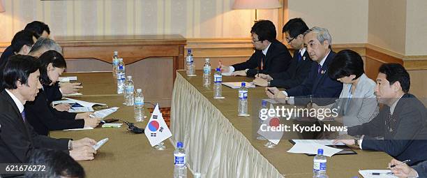 Brunei - Japanese Foreign Minister Fumio Kishida and his South Korean counterpart Yun Byung Se hold talks in Bandar Seri Begawan, the capital of...