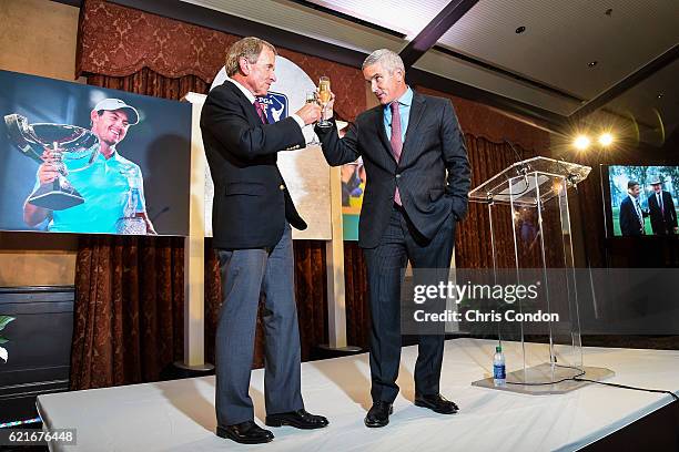 Outgoing PGA TOUR Commissioner Tim Finchem, left, is toasted by incoming Commissioner Jay Monahan during the PGA TOUR You Employee Meeting in the...