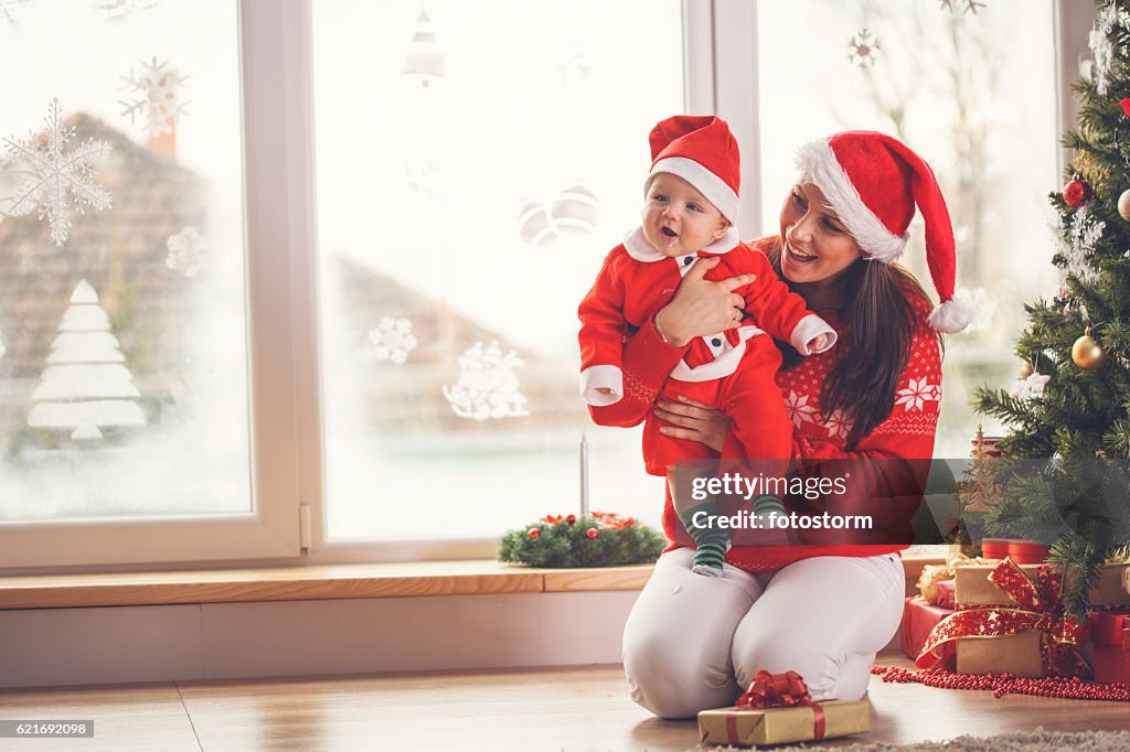 Mother and baby enjoying Christmas