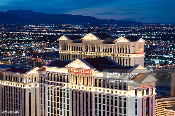 caesars palace las vegas strip at night - caesars palace las vegas stock pictures, royalty-free photos & images