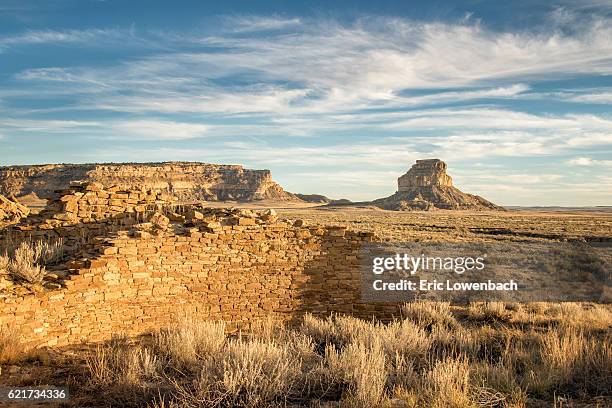 chaco canyon kiva ruins and fajada butte - butte rocky outcrop stock pictures, royalty-free photos & images