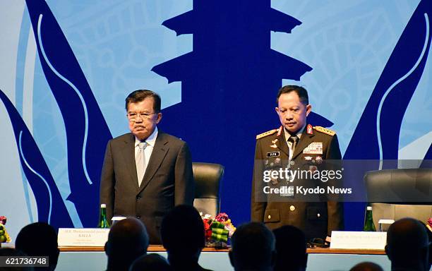 Indonesian Vice President Jusuf Kalla and the country's national police chief Tito Karnavian attend the opening ceremony on Nov. 7 for a four-day...