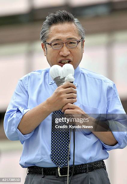 Japan - Your Party leader Yoshimi Watanabe makes a stump speech in Tokyo's Sugamo district on July 4 the day official campaigning started for the...