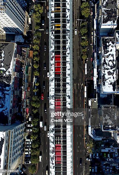 Aerial view of high-speed highway running across from the north to the south with noise barrier walls on November 8, 2016 in Shenyang, Liaoning...