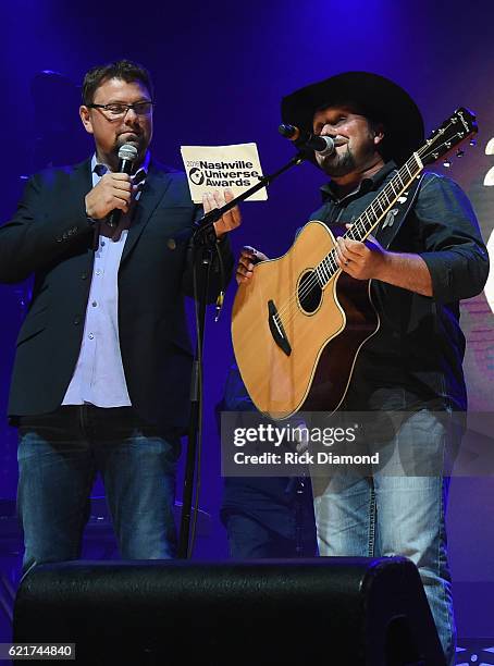 SiriusXM The Highway's Storme Warren presents Male Vocalist of the Year to Tate Stevens during the 2016 Nashville Universe Awards at Wildhorse Saloon...