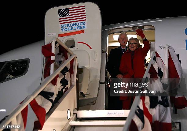 Democratic presidential nominee former Secretary of State Hillary Clinton and her husband former U.S. President Bill Clinton greet supporters at...