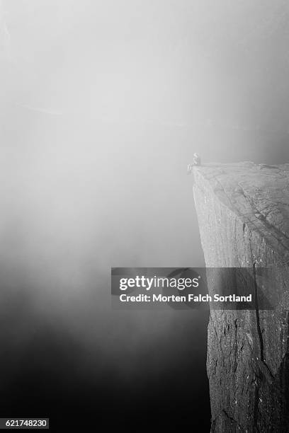 sitting on the edge - norway national day 2016 stock pictures, royalty-free photos & images