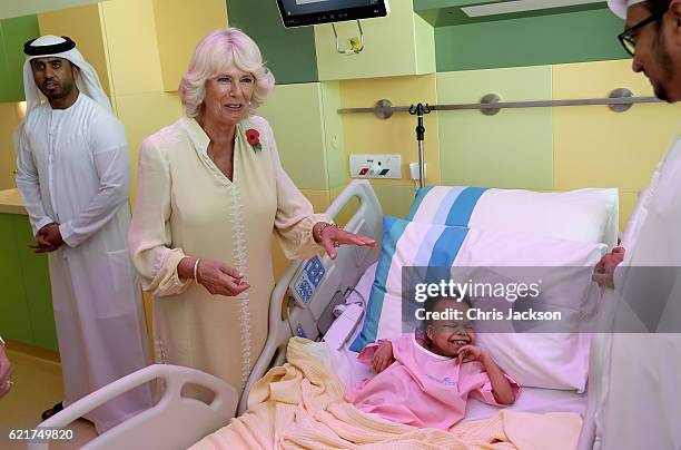 Camilla, Duchess of Cornwall meets a young girl suffering from kidney failiure at Al Jalila Children's Speciality Hospital on day 3 of a Royal tour...