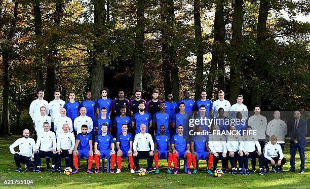 France's national football team players and staff pose for the official picture on November 8, 2016 in Clairefontaine-en-Yvelines, near Paris....