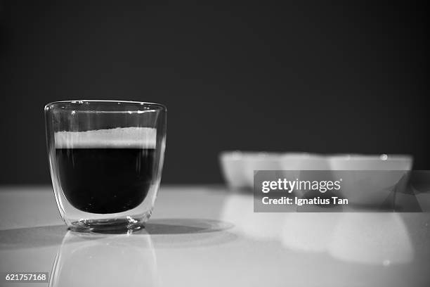 coffee cup with out of focus background - ignatius tan stock pictures, royalty-free photos & images