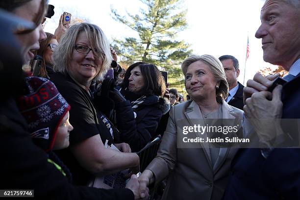 Democratic presidential nominee former Secretary of State Hillary Clinton greets supporters after voting at Douglas Grafflin Elementary School on...