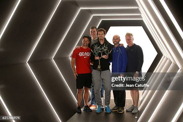 Andy Murray of Great Britain poses with his coaching team, Steven Kotze, Josh Murray, Jamie Delgado and Mark Bender following the final of the Paris...