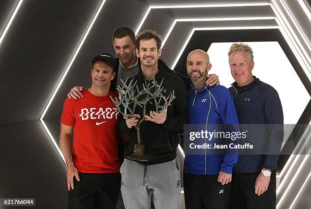 Andy Murray of Great Britain poses with his coaching team, Steven Kotze, Josh Murray, Jamie Delgado and Mark Bender following the final of the Paris...