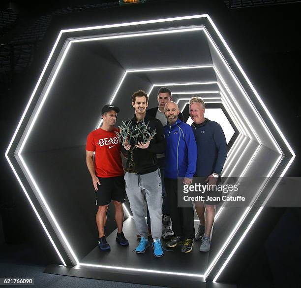 Andy Murray of Great Britain poses with his coaching team, Steven Kotze, Josh Murray, Jamie Delgado and Mark Bender following the final of the Paris...