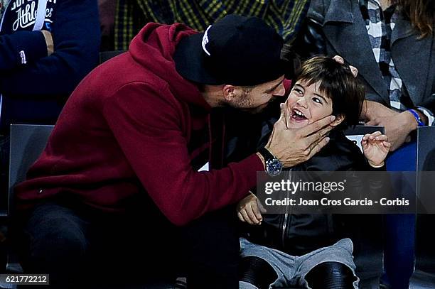 The F.C Barcelona player, Gerard Piqué and his son Milan Piqué, attending the basketball Spanish Endesa League match between F.C Barcelona Lassa and...