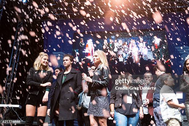 Olivia Holt, Brian Justin Crum, John Lindahl, Riley Mcdonough, Toby Mcdonough, Connor Mcdonough"nTony McEwing, and Maria Sansone on stage at the...