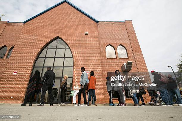 Voters line up outside Liberty Baptist Church to cast their ballot in the 2016 Presidential Election on November 8, 2016 in Atlanta, Georgia....