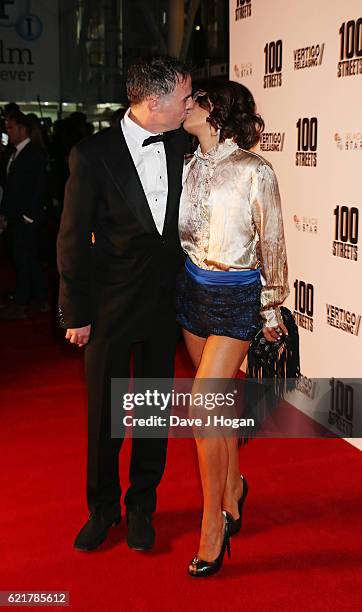 Charlie Creed-Miles and a guest attend the UK Premiere of "100 Streets" at the BFI Southbank on November 8, 2016 in London, United Kingdom.