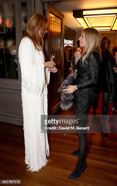 Olivia Inge and Marissa Montgomery attend the launch of The Rupert Sanderson Champagne Slipper For 34 Mayfair, at 34 Mayfair on November 8, 2016 in...