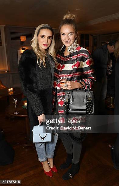 Camila Carril and Nina Suess attend the launch of The Rupert Sanderson Champagne Slipper For 34 Mayfair, at 34 Mayfair on November 8, 2016 in London,...