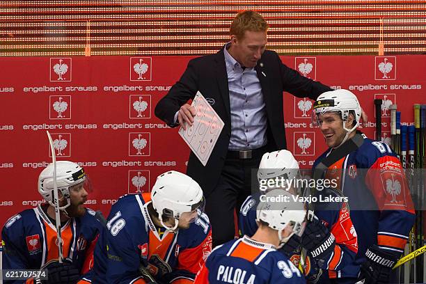 Jorgen Jonsson, assistant coach of Vaxjo Lakers and Robert RosÃ©n of Vaxjo Lakers is happy after the goal by Robert RosÃ©n of Vaxjo Lakers during the...