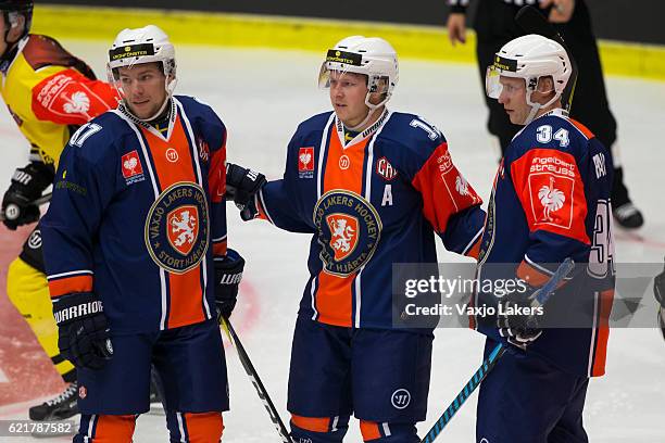 Robert RosÃ©n of Vaxjo Lakers, Tuomas Kiiskinen of Vaxjo Lakers and Olli Palola of Vaxjo Lakers celebrates their goal during the Champions Hockey...