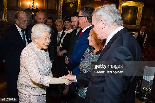 Prince Philip, Duke of Edinburgh Queen Elizabeth II and Martin McGuinness attend a Co-Operation Ireland Reception at Crosby Hall on November 8, 2016...