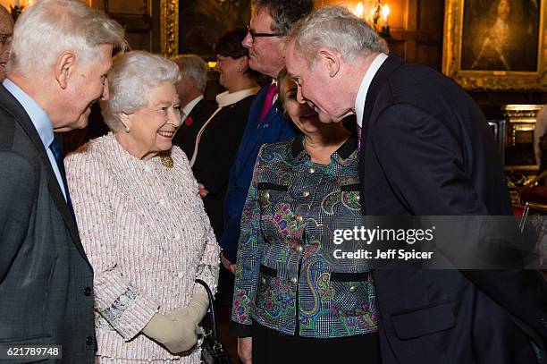 Dr. Christopher Moran, Chairman Co-operation Ireland, Queen Elizabeth II and Martin McGuinness attend a Co-Operation Ireland Reception at Crosby Hall...