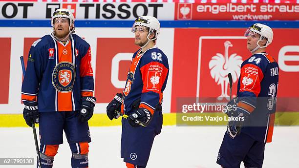 Erik Josefsson of Vaxjo Lakers, Arvid Lundberg of Vaxjo Lakers and Olli Palola of Vaxjo Lakers await the referees video screening in the sudden death...