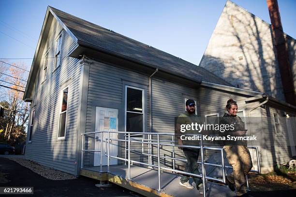 New Hampshire citizens leave the West Congregational Church after voting on November 8 in CONCORD, New Hampshire. Americans today will choose between...