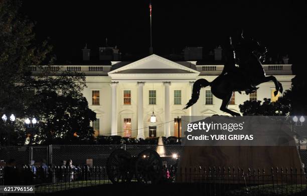 The White House in Washington,DC is seen during the US presidential election night on November 8, 2016. Millions of Americans turned out Tuesday to...