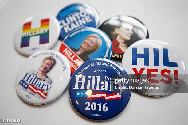 Hillary Clinton buttons are seen during a 'Democrats Abroad' function at the Kingston Hotel in Melbourne on November 9, 2016 in Melbourne, Australia....