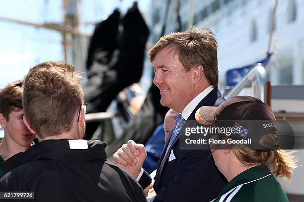 King Willem-Alexander of The Netherlands speaks to sudents on his visit to the Spirit of New Zealand Youth Training Vessel at Princes Wharf on...