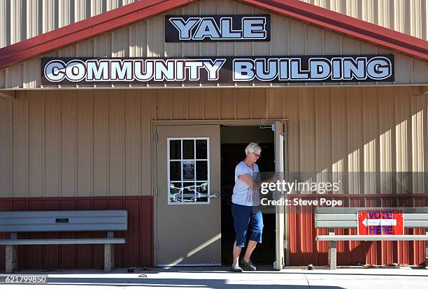 Voters head to the polling place on November 8, 2016 in Yale, Iowa. Americans today will choose between Republican presidential candidate Donald...