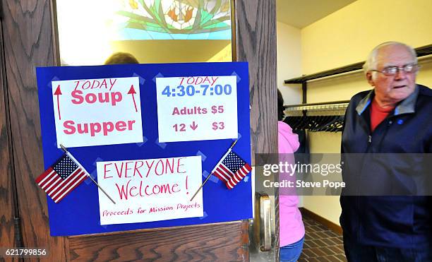 Iowa voters head to polling locations in expected record numbers on November 8, 2016 in Woodward, Iowa. Americans today will choose between...