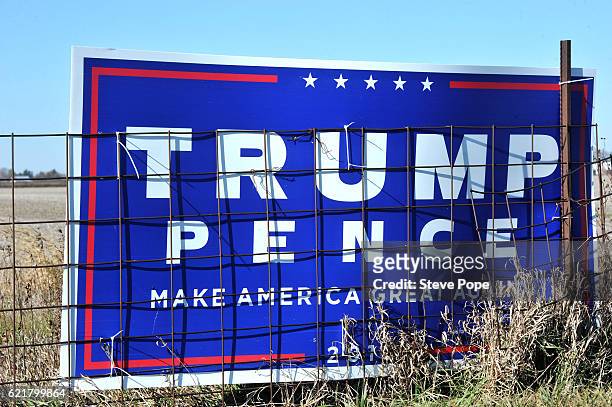 Election signs dot the countryside across Iowa on November 8, 2016 near Dexter Iowa. Americans today will choose between Republican presidential...