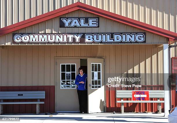 Voters head to the polling place on November 8, 2016 in Yale, Iowa. Iowans are expected to vote in record numbers and it's been reported that over...