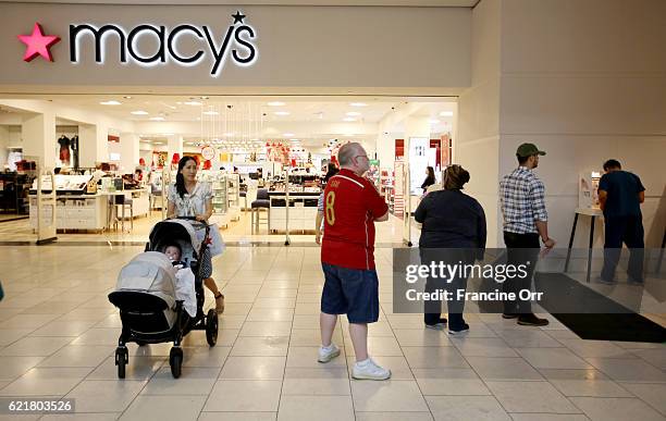 People vote at outside Macy's Westfield Santa Anita in Arcadia, CA November 8, 2016.