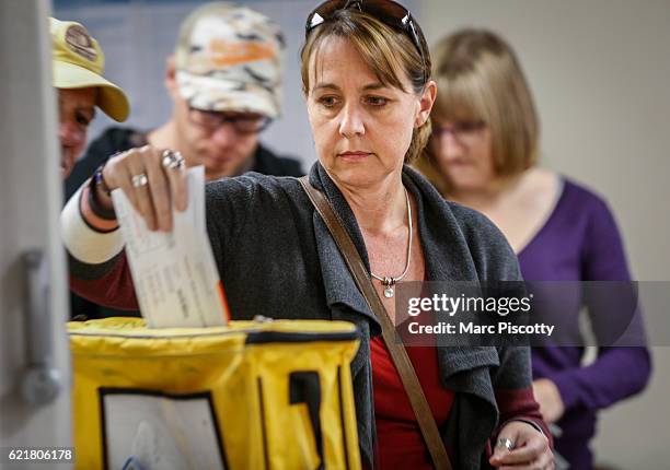 Kerry Hinton of Lakewood, Colorado casts her ballot at the Jefferson County Fairgrounds on November 8, 2016 in Golden, Colorado. Voters go to the...